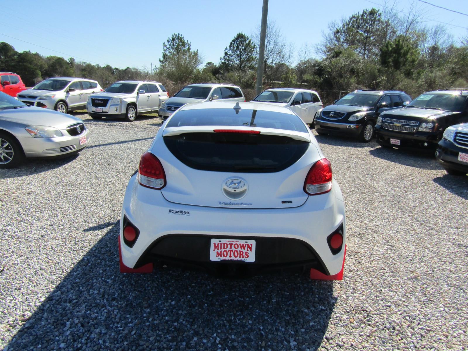 2014 White /Red Hyundai Veloster (KMHTC6AE3EU) with an 4 CYL engine, 6-Speed Manual transmission, located at 15016 S Hwy 231, Midland City, AL, 36350, (334) 983-3001, 31.306210, -85.495277 - Photo #5